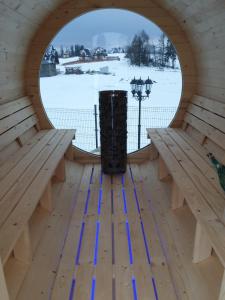 an inside view of a sauna with a window at Gler house in Białka Tatrzanska