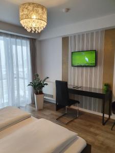 TV a/nebo společenská místnost v ubytování Vila Privilege Felix