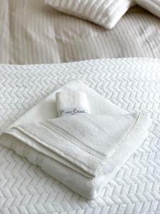 A bed or beds in a room at Ski Area 202 apt, The Castle 1, Pamporovo