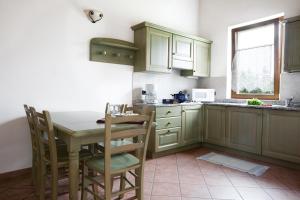 Kuchyňa alebo kuchynka v ubytovaní Agritur La Cort