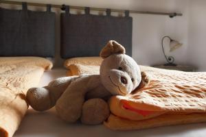 Posteľ alebo postele v izbe v ubytovaní Agritur La Cort