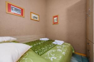 Postel nebo postele na pokoji v ubytování Apartment with pool Visnjan