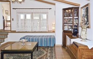 A bed or beds in a room at 1 Bedroom Gorgeous Apartment In Selva