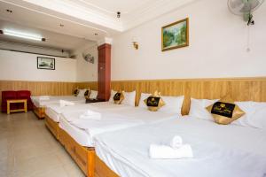 Letto o letti in una camera di Khanh Hong Da Lat