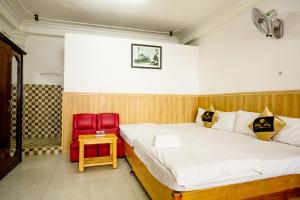 Letto o letti in una camera di Khanh Hong Da Lat
