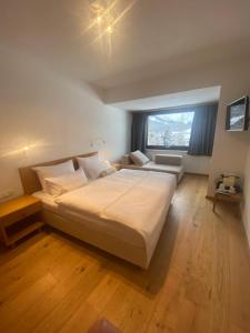 Letto o letti in una camera di Hotel Berghof