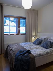 Un pat sau paturi într-o cameră la Ylläs with a view