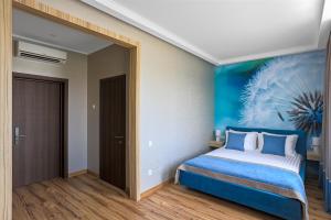 Postel nebo postele na pokoji v ubytování Redling Hotel