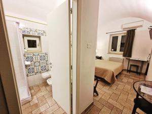 Tempat tidur dalam kamar di Torretta ai Sassi