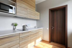 Kuchyň nebo kuchyňský kout v ubytování Redling Hotel