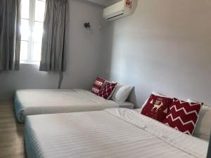 Katil atau katil-katil dalam bilik di Blue Andaman Seaview Families Suite Apartment