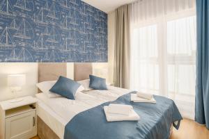 Posteľ alebo postele v izbe v ubytovaní Sunset Resort II, Nadmorska 104 + 37 fotografií