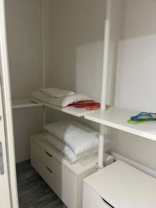 A bed or beds in a room at Very House