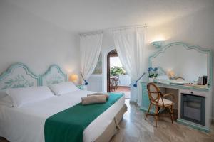 Łóżko lub łóżka w pokoju w obiekcie Hotel Balocco