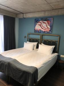 Letto o letti in una camera di Paliani Hotel