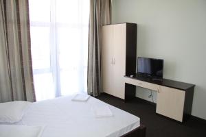 TV a/nebo společenská místnost v ubytování Berizka Park Hotel