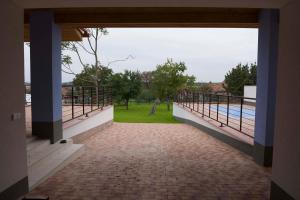 a view from the outside of a house with a balcony at Chalupa Morava in Uherčice