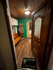 a hallway with a door with a sign on it at Hepnarova Bouda in Horní Malá Úpa