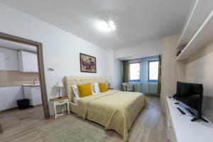 Телевизор и/или развлекательный центр в Avenue Parliament Old Town - Avenue Hotels