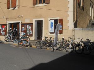 a bunch of bikes parked on the side of a building at Les 3 Marmottes in Lus-la-Croix-Haute +11 photos