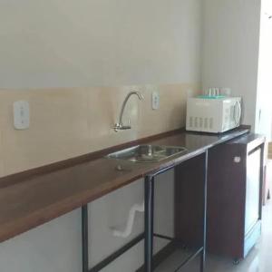 Virtuvė arba virtuvėlė apgyvendinimo įstaigoje Recanto do Bosque