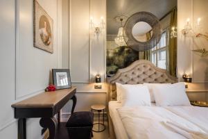 Posteľ alebo postele v izbe v ubytovaní BpR Violet Noir Apartment with A/C