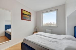 Posteľ alebo postele v izbe v ubytovaní Comfort Apartments Horyzonty