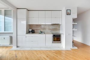 Kuchyňa alebo kuchynka v ubytovaní Comfort Apartments Horyzonty