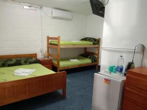 Hostería El Peregrino tesisinde bir odada yatak veya yataklar