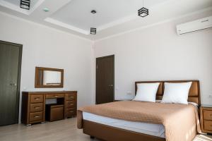 Cama o camas de una habitación en Park-Hotel Vishnevaya Gora