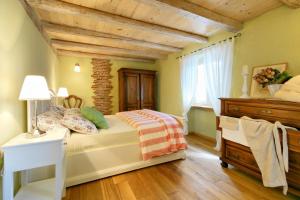 Postel nebo postele na pokoji v ubytování Holiday Home Casa Buscina