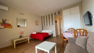 Łóżko lub łóżka w pokoju w obiekcie estudio con vista al mar 19