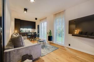 Posedenie v ubytovaní Apartament Deluxe BLACK ORCHID Baltic Concept Dźwirzyno