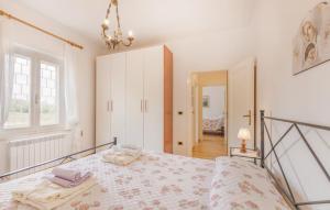 A bed or beds in a room at Le Vigne di Clementina Fabi