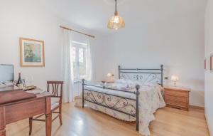 A bed or beds in a room at Le Vigne di Clementina Fabi