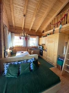 A bed or beds in a room at Almhütten Skorianz