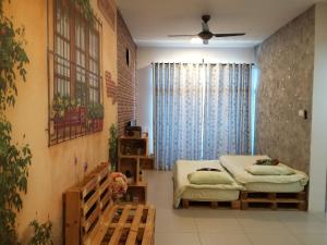 En eller flere senge i et værelse på Vin-Cottage Cameron Golden Hills (Next to Night Market)