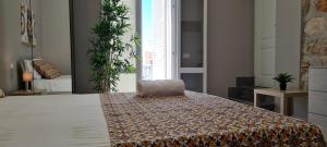 A bed or beds in a room at House Orlando