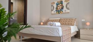 A bed or beds in a room at House Orlando