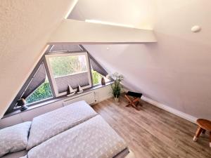Postel nebo postele na pokoji v ubytování Haus Findling