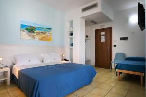 Postel nebo postele na pokoji v ubytování Gigli Hotel Salento + 37 fotografií