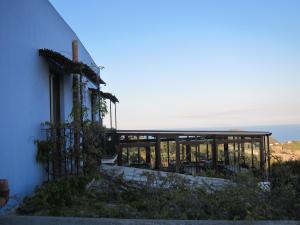 a building with a view of the ocean at agriturismo u zu peppino in Lipari +31 photos