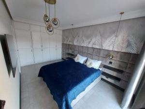 Posteľ alebo postele v izbe v ubytovaní MALAGA APARTAMENTY BALTICUS