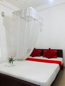 Letto o letti in una camera di Pawana Rest