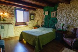 Säng eller sängar i ett rum på La Locanda delle Streghe - Relais Ristorante