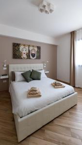 Giường trong phòng chung tại Sicily Comfort Milazzo