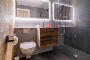 Koupelna v ubytování Apartment Ahornisegg - GRIWA RENT AG + 19 fotografií