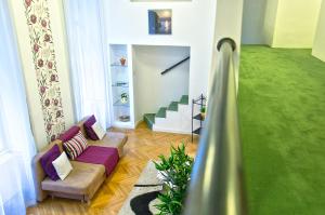 A seating area at The Fashion Street Apartment
