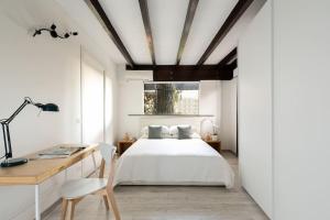 Un pat sau paturi într-o cameră la ELEGANTE VILLINO nel verde di Roma