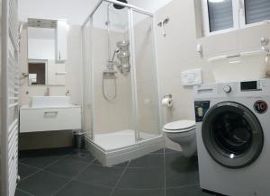 Ванная комната в Villa Radoš - 4 Sterne, 4 Apartments für maximal 22 Gäste